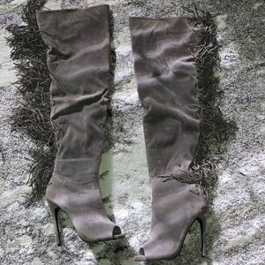 Thigh boots. Size 6.5. Color on the box says Taupe
